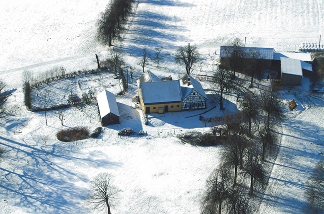 Winterlandschaft mit bergischem Fachwerkhaus in Lennep